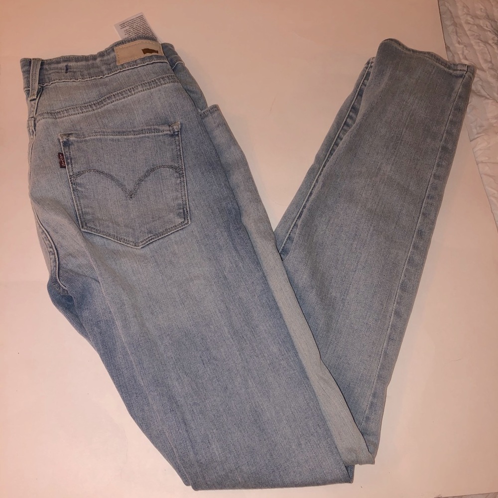 High Rise Skinny Levis size 4/W27